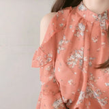 Elegant off-shoulder chiffon blouse—long sleeves and stylish design for a feminine, modern look.
