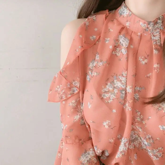 Elegant off-shoulder chiffon blouse—long sleeves and stylish design for a feminine, modern look.