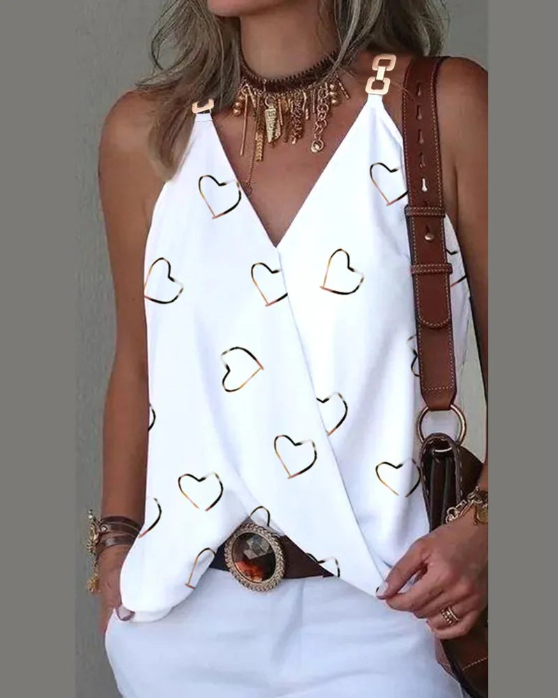 new sleeveless V-neck blouse—lightweight, printed, and perfect for a youthful summer look.