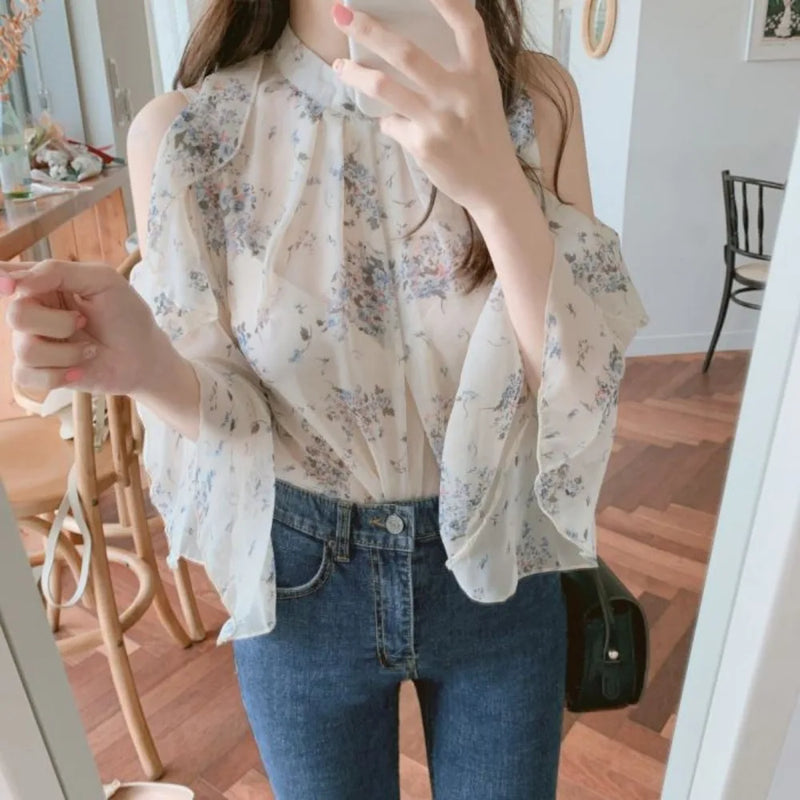Elegant off-shoulder chiffon blouse—long sleeves and stylish design for a feminine, modern look.