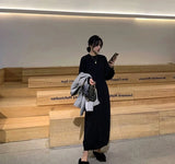 Black crochet knit maxi dress—loose, stylish, and perfect for evening wear with a Y2K Harajuku vibe