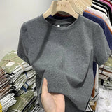 White cotton Y2K-style T-shirt for women—short sleeves, comfy fit, and perfect for spring